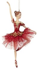 Eine Ballerina Figur in Rot