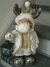 Rentier mit Laterne für