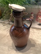 Tonflasche mit Deckel braun