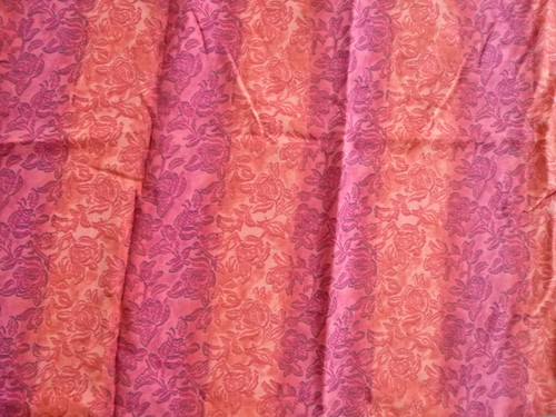 Stoff rot orange rosenmuster