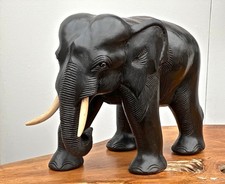 Elefant aus Holz, schwarz