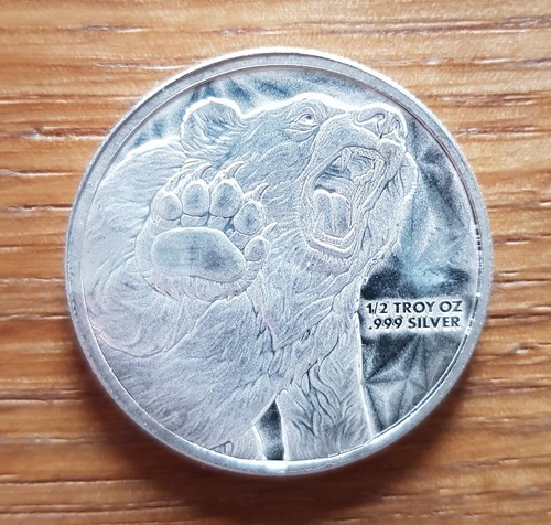 2oz silber stier - 1/2oz, und