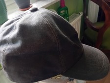 Basecap, braun, imprägniert, gefüttert m. herausklappbarem Ohrenschutz