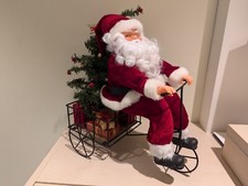 Weihnachtsmann mit Dreirad / Beleuchtung und Musik