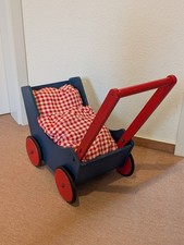 Haba Puppenwagen blau mit Kissen und Decke