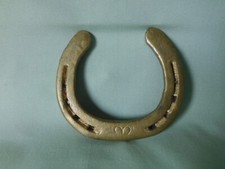 älteres Hufeisen goldfarben