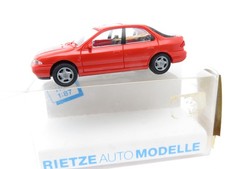 345HO /04 - Rietze H0 - Ford Mondeo Ghia Inter Modell Bau ´93 rot - top in OVP