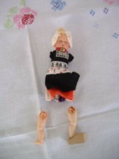 Puppe liegend mit  H 8 cm x 5