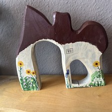 Süßes Haus aus Holz, Passend