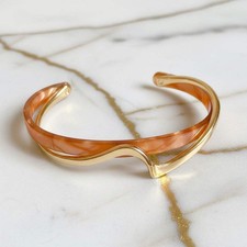 Gold Rot Orange Wellenform