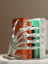Skelett Hand Buchstütze –