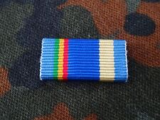 A27-056) UN Service Bandspange