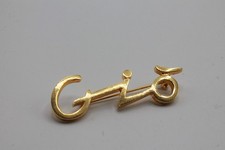 Giorgio Armani Brosche