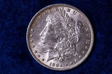  1884-O Silver (.900) MORGAN Dollar - AU
