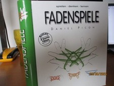 Buch, Fadenspiele, spielen, denken, lernen von Daniel Picon, enthält drei Fäden