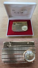 Aus alter Feuerzeug Sammlung Benzin Feuerzeug mit Uhr SUWACO Geneve Swiss Made