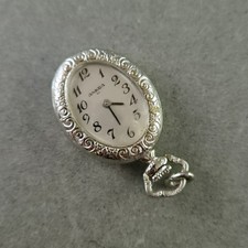 Vintage ANKRA Anhängeruhr – Versilbert mit floralen Verzierungen