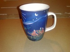 Agatha`s Bester Porzellan Weihnachts-Becher bunt auf cremeweiß H: 10,5cm.