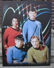 Kirk, Spock, Pille, Uhura