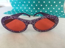 coole Sonnenbrille lila Glitzersterne getönte Gläser Partybrille ca. 15 cm breit