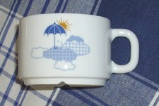 Friesland Life 1 Teetasse weiß Regenschirm Wolken Sonne Dekor