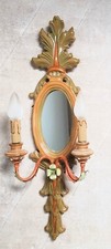 Dekorative Wandlampe mit 2 Kerzenhaltern und Spiegel