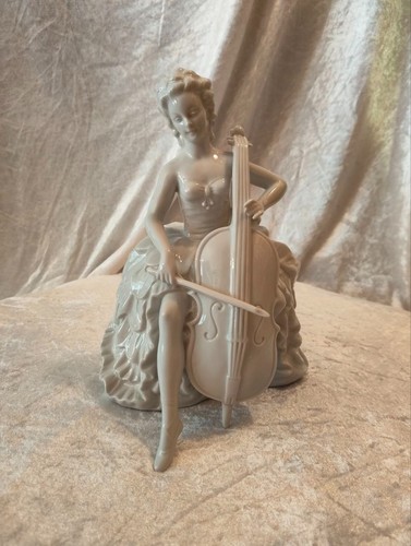 Porzellanfigur cellistin - porzellanfigur,