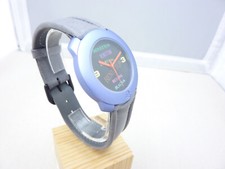 Benetton by Bulova Quartz Armbanduhr Herren Damen Unisex Vintage 90’s - 35mm.