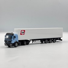 Mercedes-Benz SK mit weißem Auflieger "TIP" - European Trailer Rental 1/87 H0