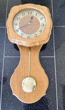 AMS Funk-Pendeluhr Massivholz Braun Mineralglas