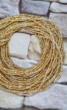 Splitter und Gold Taille