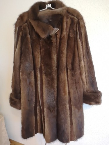 Eleganter pelzmantel - eleganter,