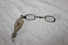 Lorgnon als Anhänger aus