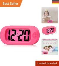 Stylischer rosa Reisewecker