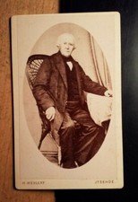 sitting old man in wicker