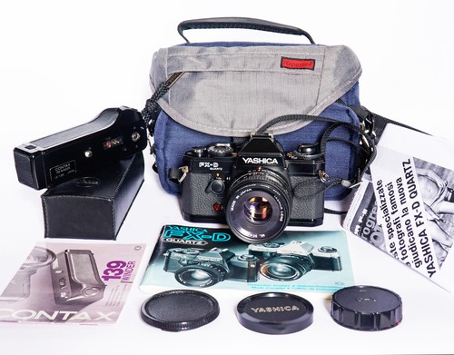 Yashica quartz - +,
