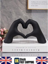 Schwarzes Herz Hand Skulptur