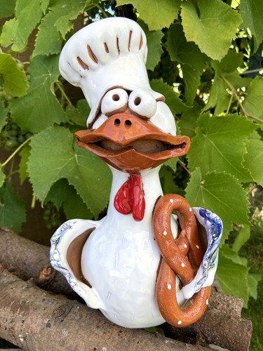 Huhn bäcker mit brezel - huhn,