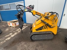 Kompaktbagger Radlader