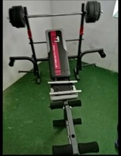 Hantelbank mit Gewichten mit 2