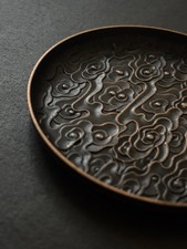 Edler Untersetzer aus Metall |