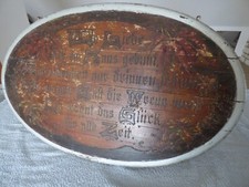 Antiker Sinnspruch auf Holz