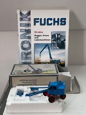 NZG Fuchs Bagger in 1:50, Art. Nr. 520, + Buch 50 Jahre Fuchs, Fuchschronik