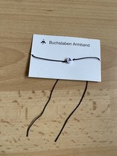 Buchstaben Bändchen Armband Glücksbringer Schwarz Stoff Neu