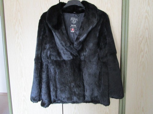 Eine schwarze damen - damen, pelzjacke