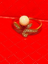 Ring mit weißem Opal und Brillanten ,GG 18K, 3.2g,RW: 51