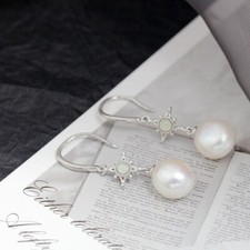 N06 earrings star with baroque