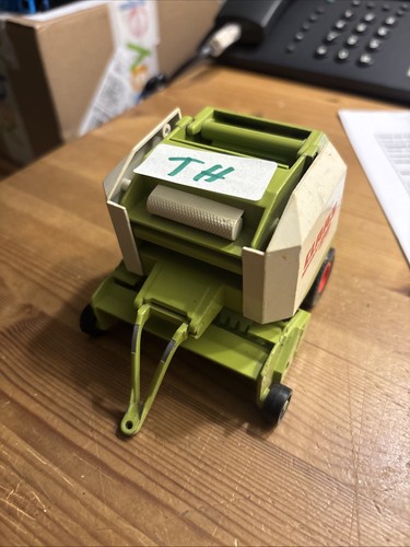 Siku farmer 2268 claas - siku,