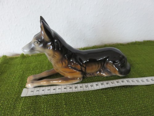 Porzellanfigur liegender - porzellanfigur,