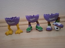 Drei Eierbecher Milka.